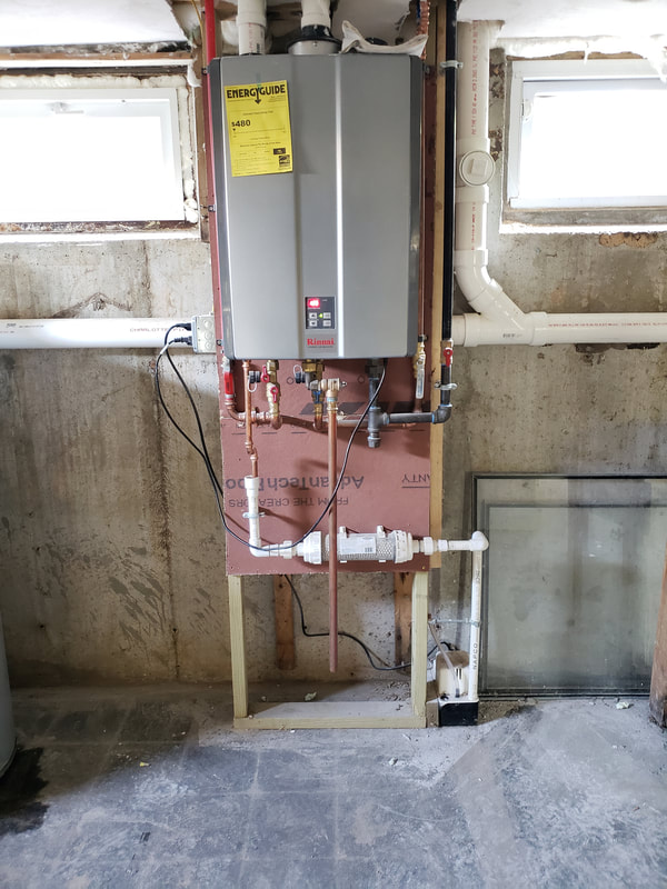 house remodel project framework installing Rinnai 
 tankless water heater