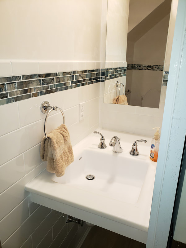 Accessible sink installation for complete bathroom remodel