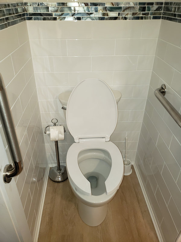 Accessible toilet installation for complete bathroom remodel