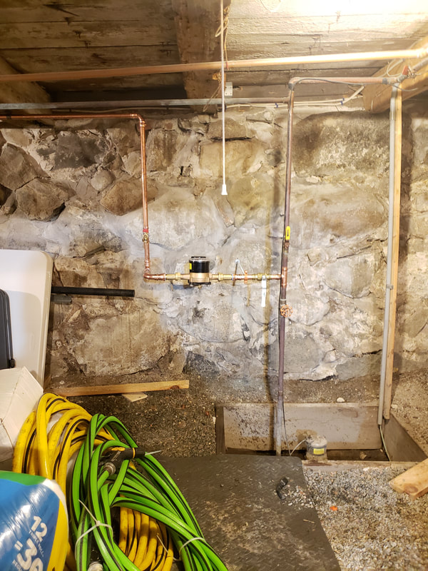 Required back flow prevention in basement