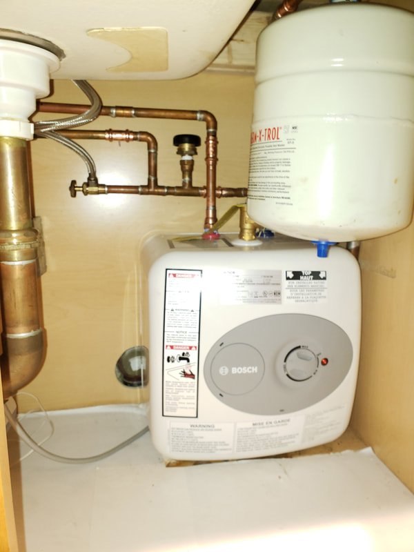 under the counter electric hot water heater after installation